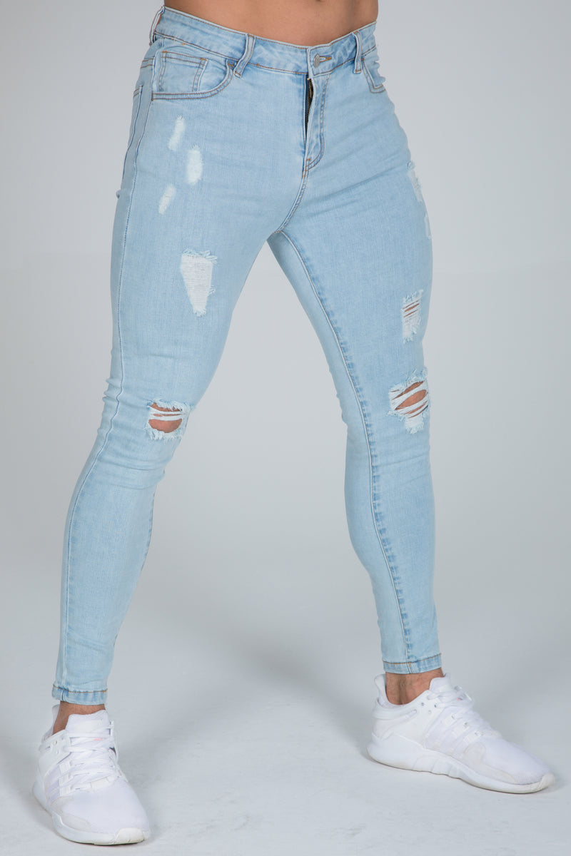 Light Blue Jeans – Ripped & Repaired