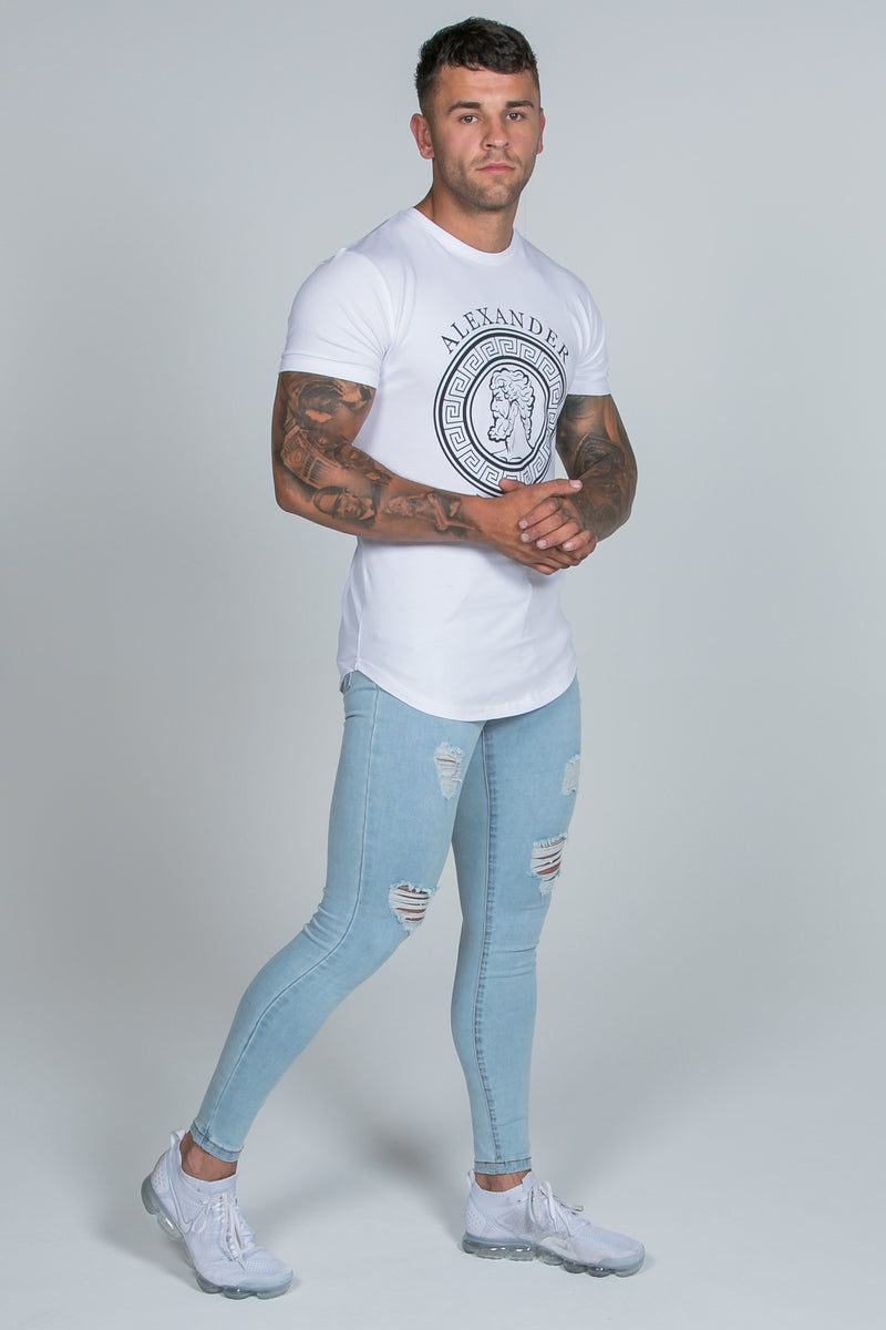 Light Blue Jeans – Ripped & Repaired